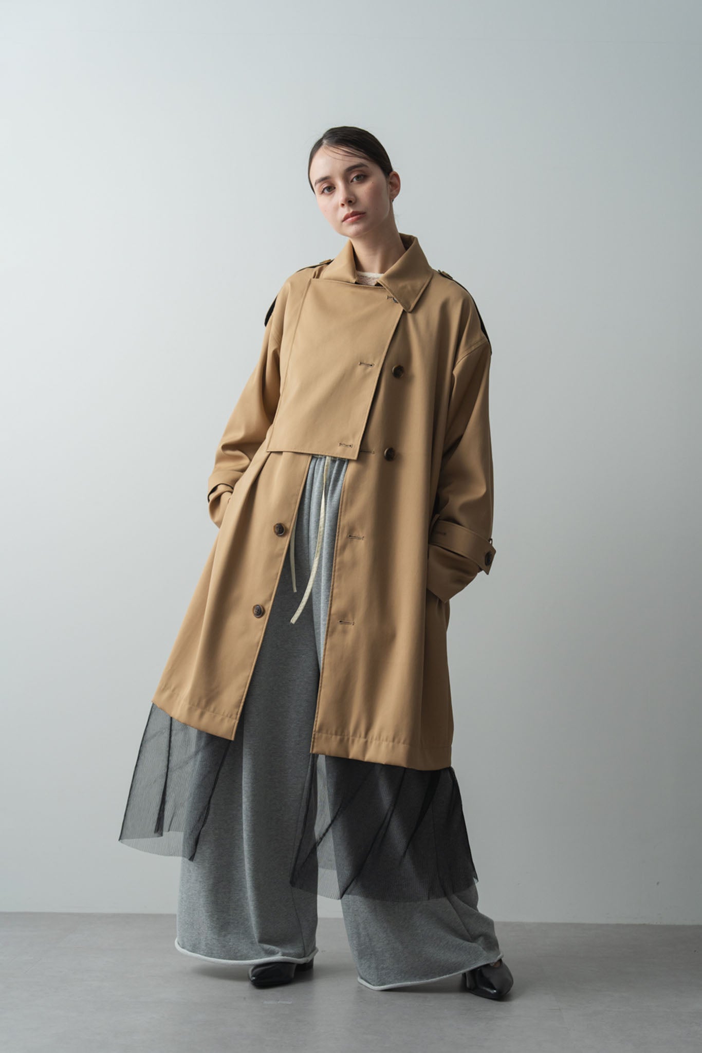 バイカラートレンチコート
