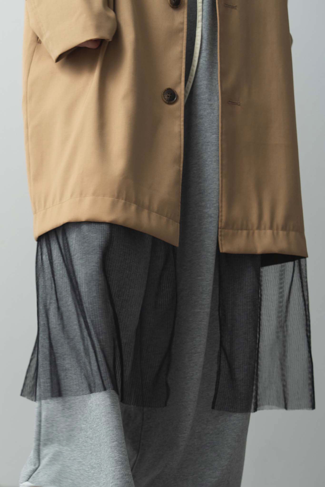 バイカラートレンチコート