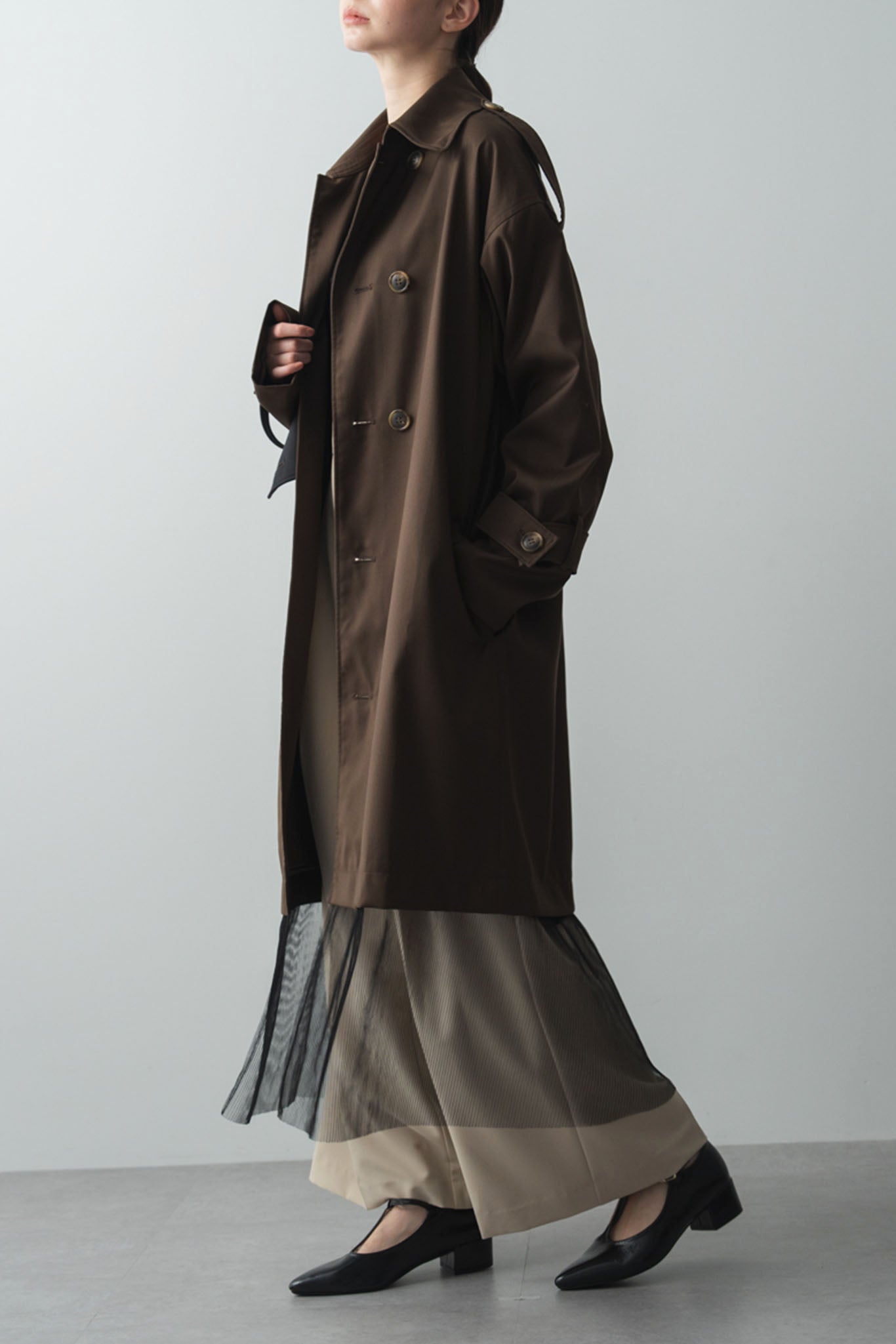 バイカラートレンチコート
