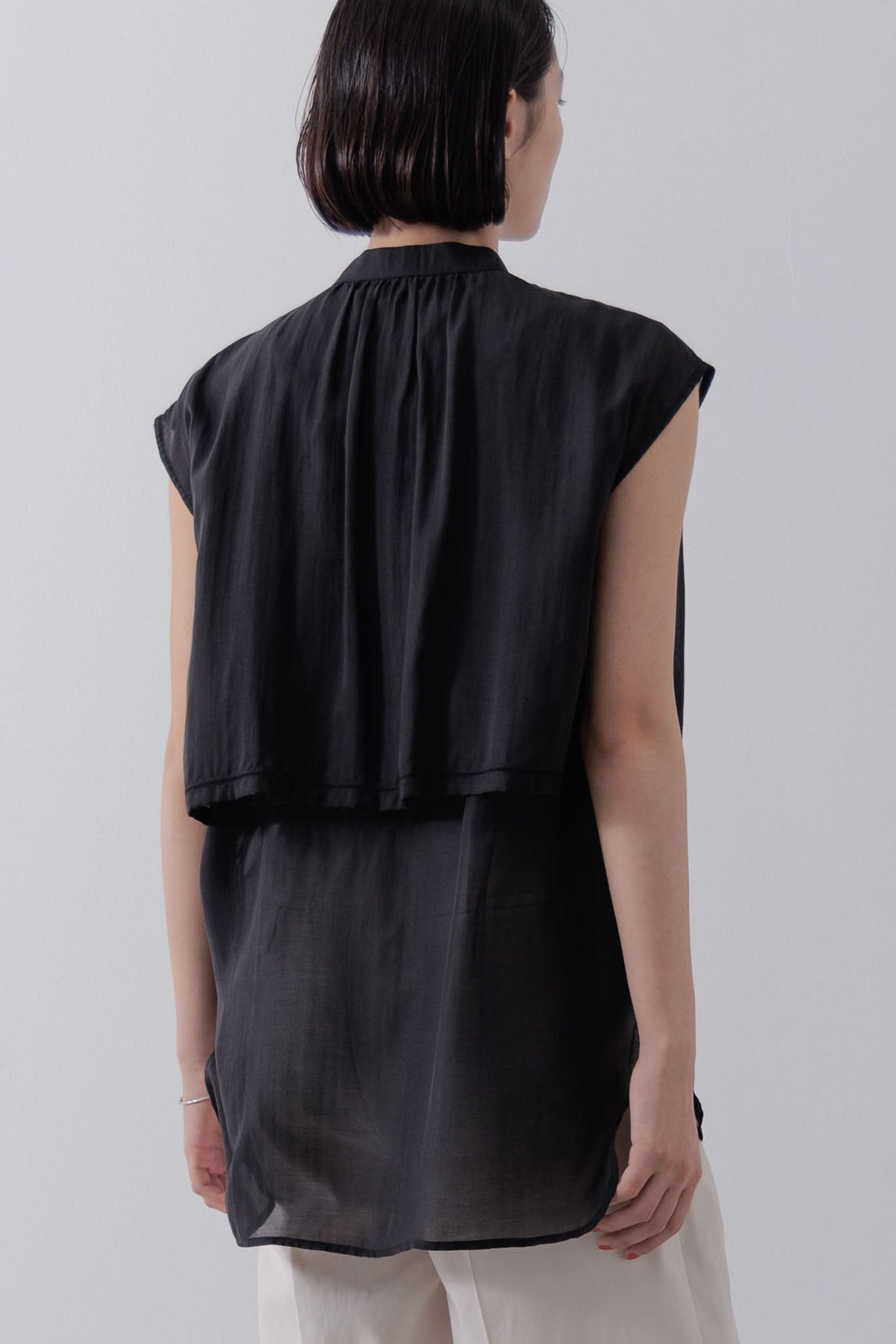 Sleeveless Cape Blouse