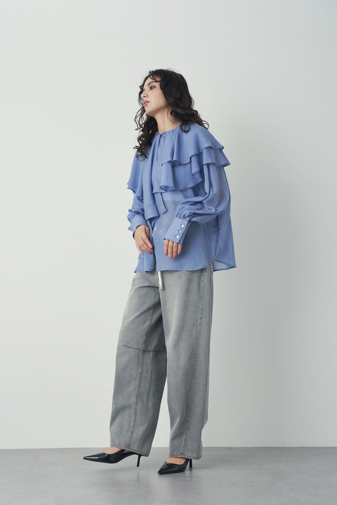 シアアシメラッフルブラウス