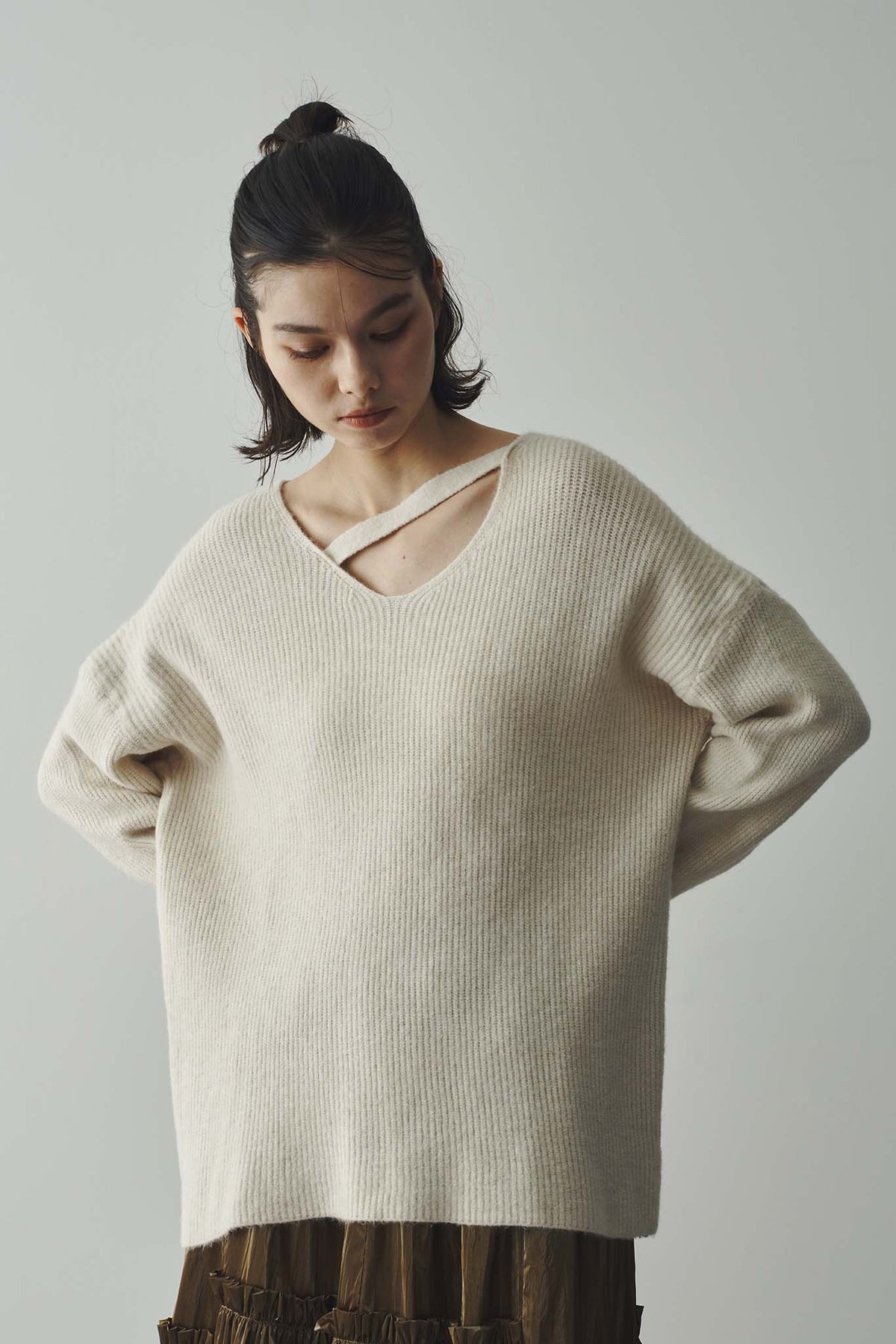 One-sided neck design knit
