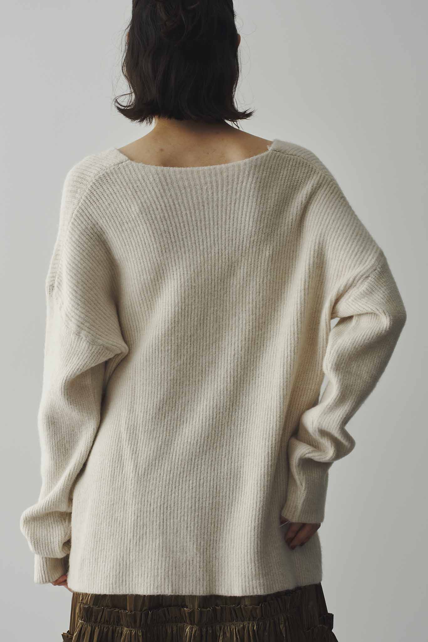 片畔ネックデザインニット