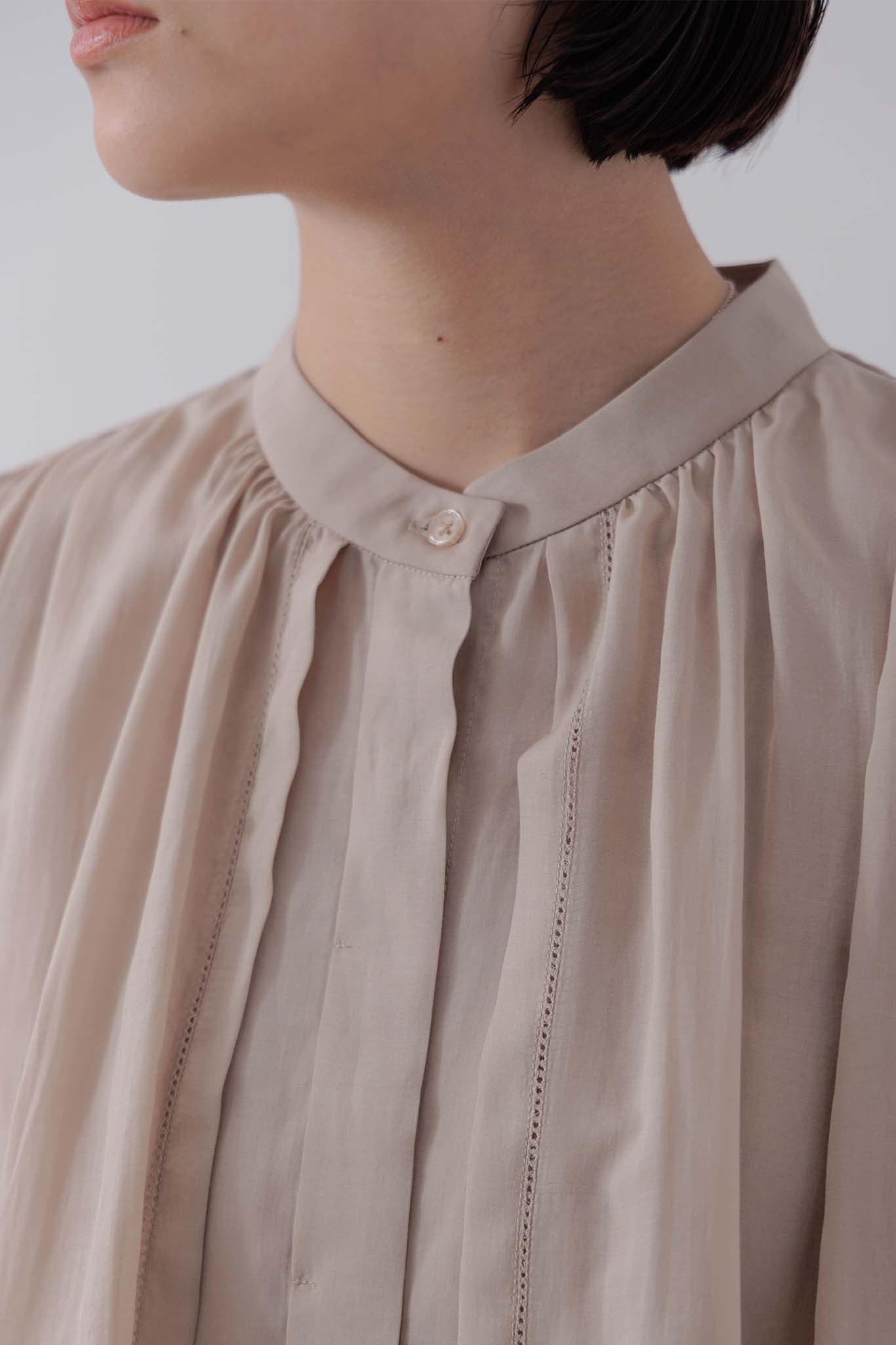 Sleeveless Cape Blouse