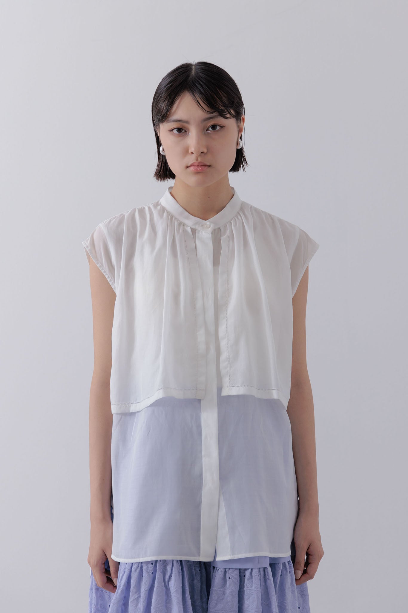 Sleeveless Cape Blouse