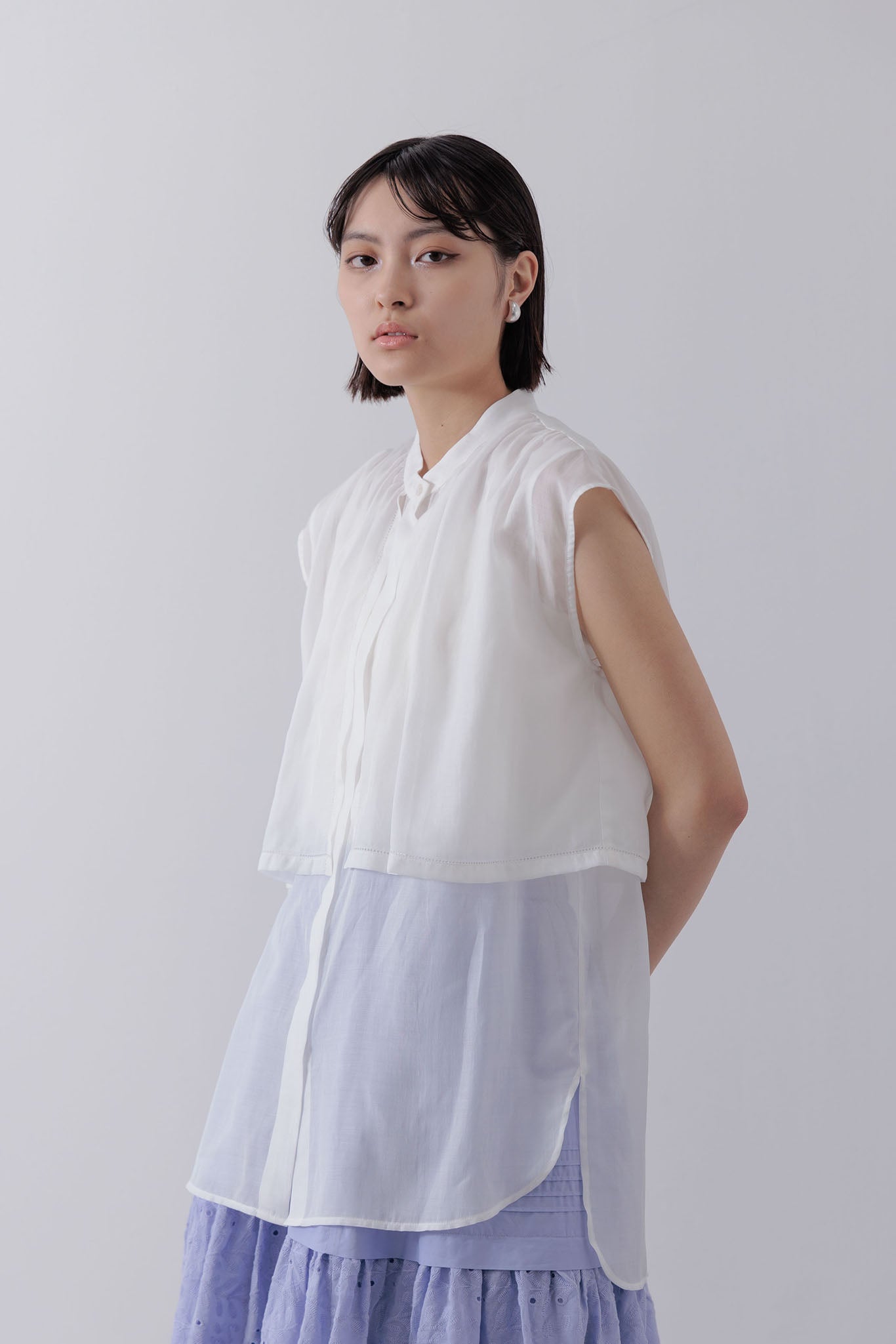 Sleeveless Cape Blouse