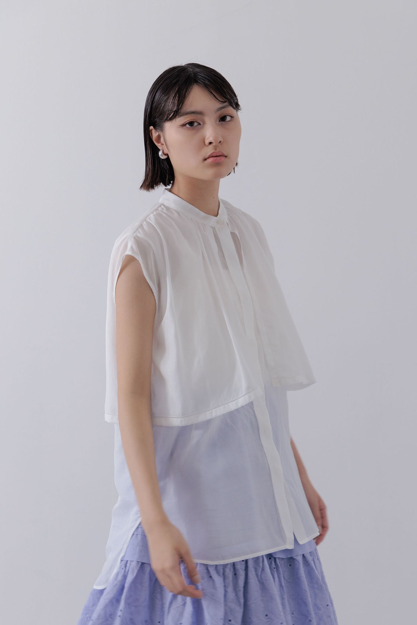 Sleeveless Cape Blouse