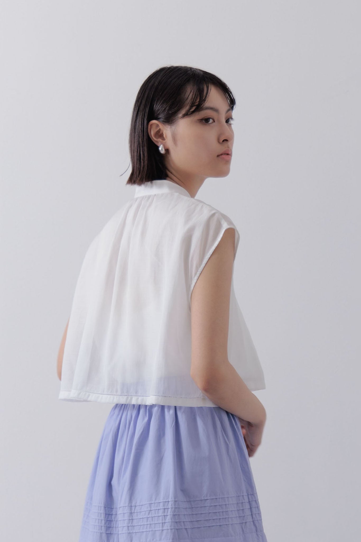 Sleeveless Cape Blouse