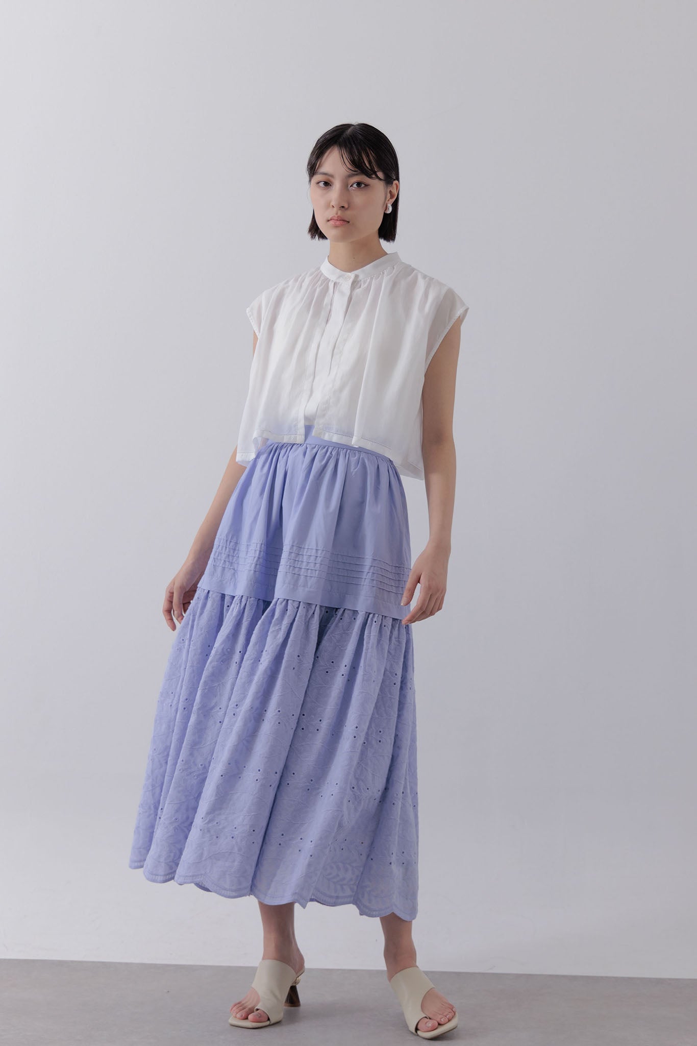 Sleeveless Cape Blouse