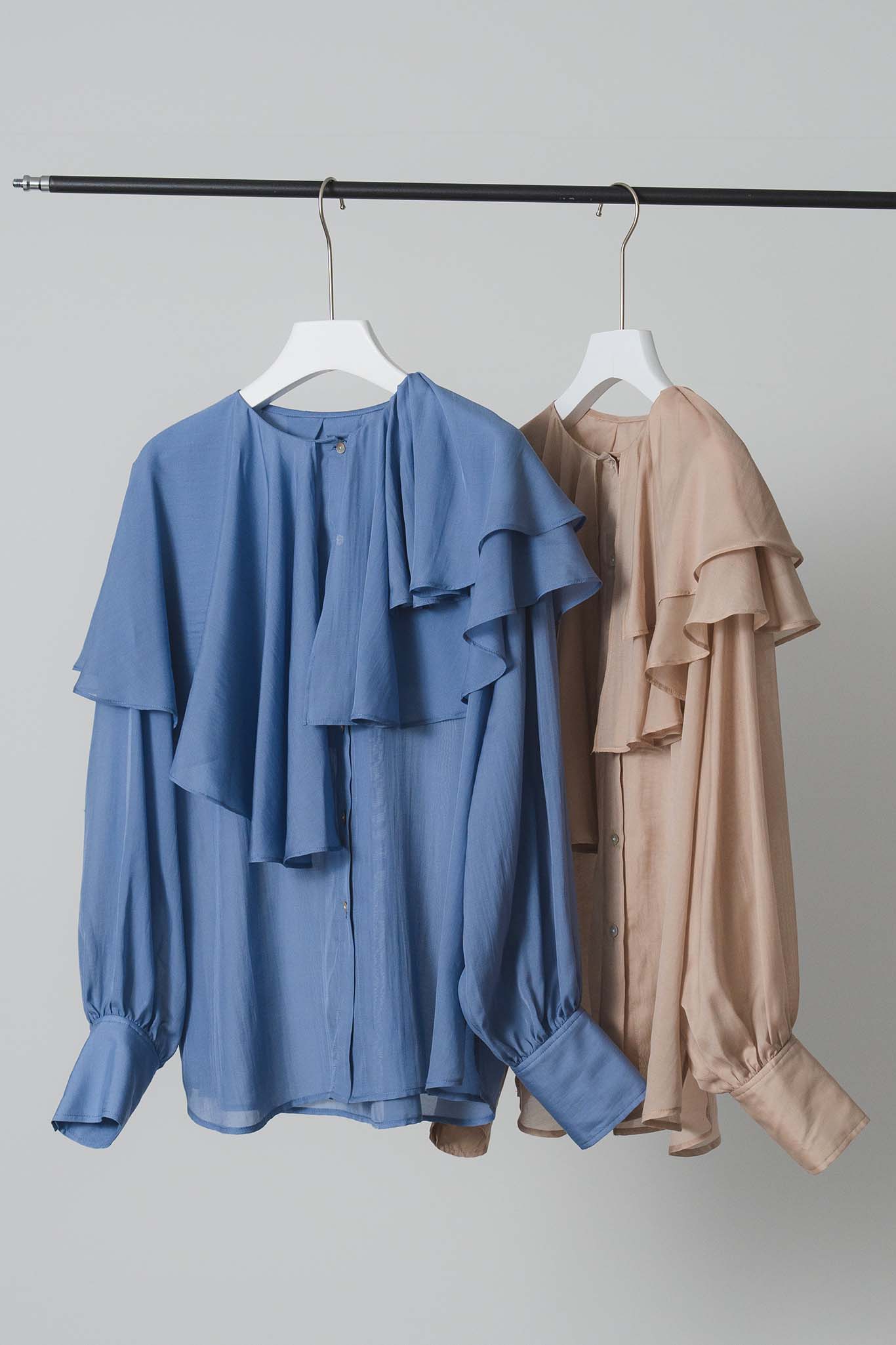 シアアシメラッフルブラウス