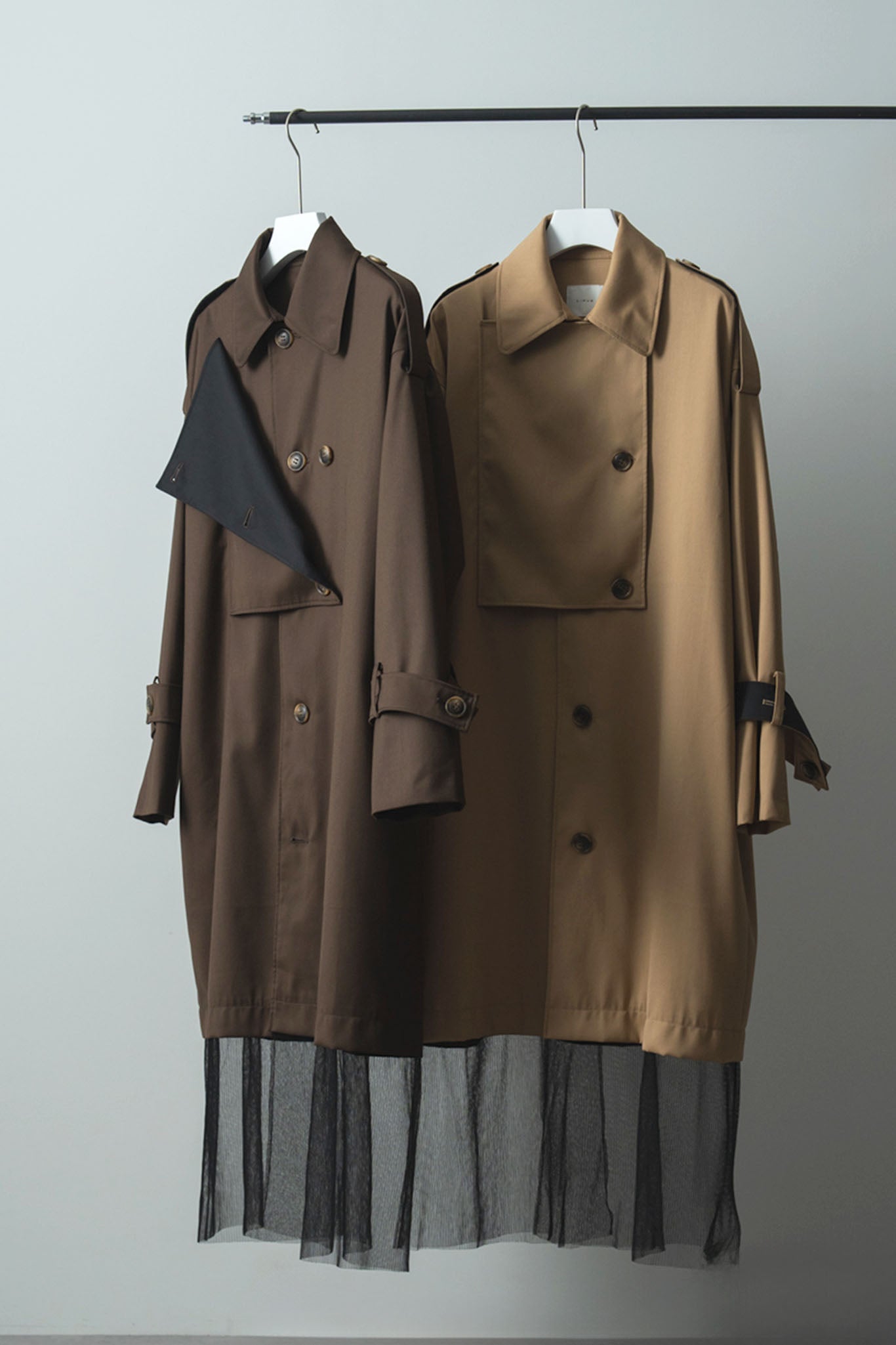 バイカラートレンチコート