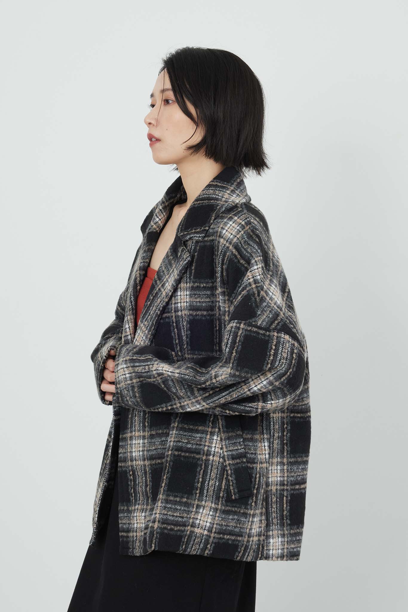 チェックピーコート