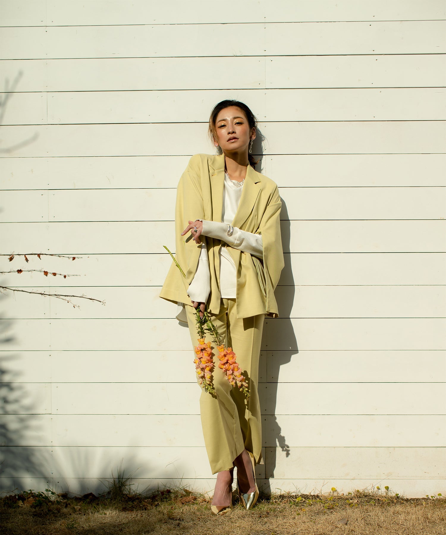 Double-breasted jacket with slit sleeves