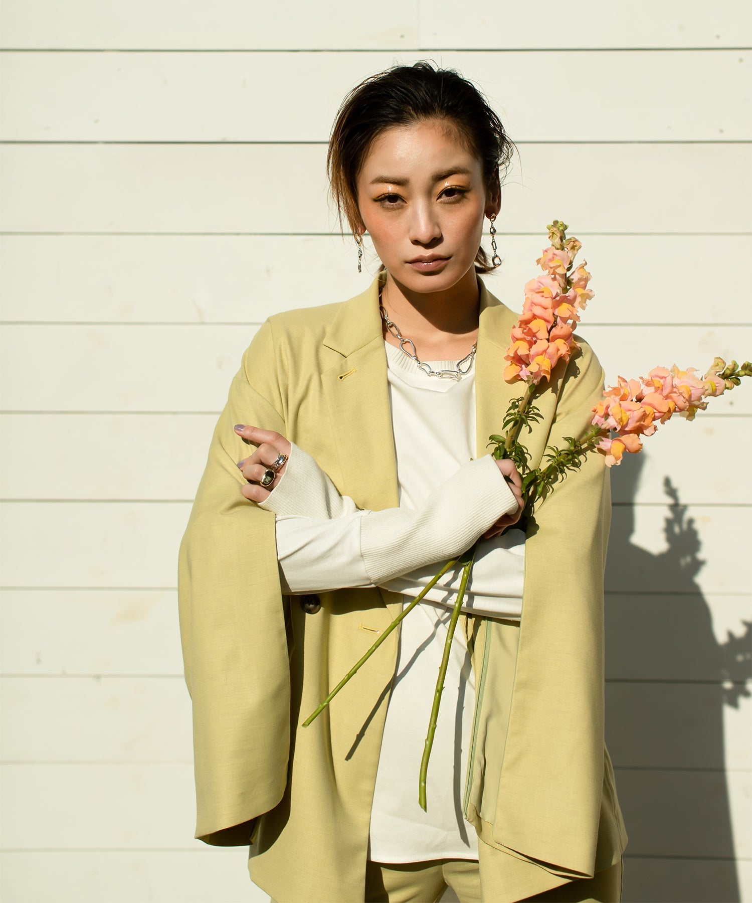Double-breasted jacket with slit sleeves