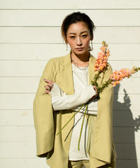 Double-breasted jacket with slit sleeves