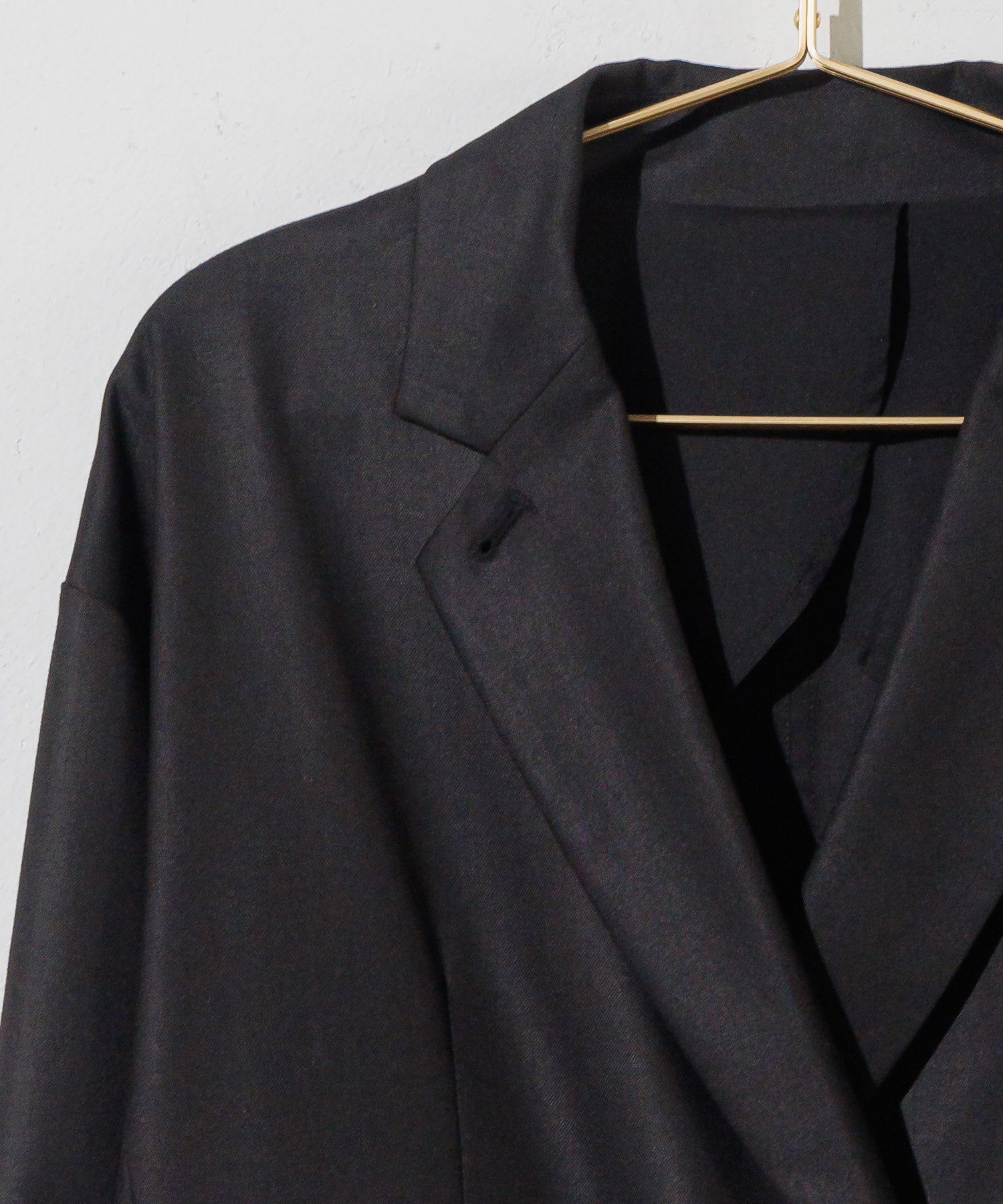Double-breasted jacket with slit sleeves