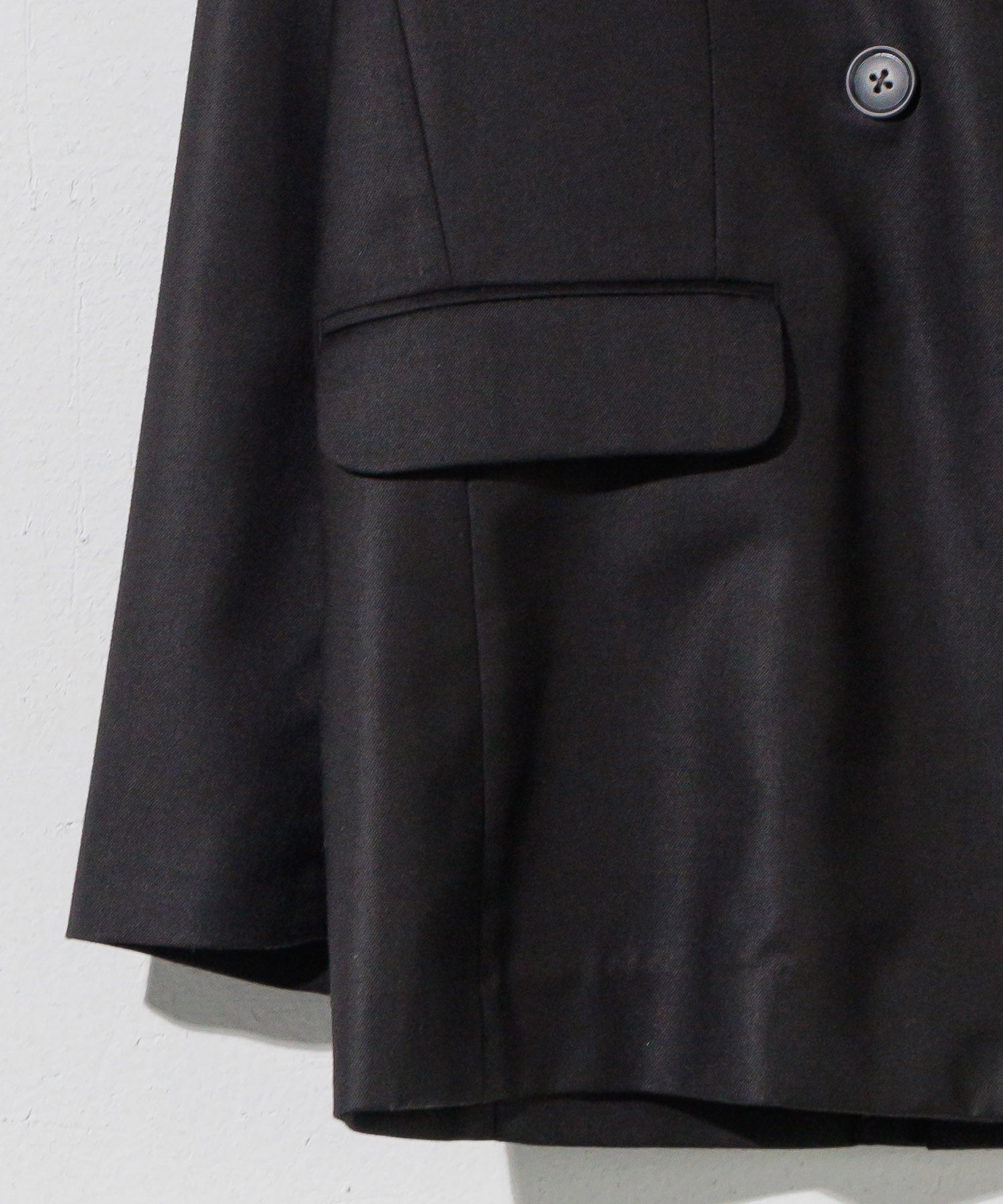 Double-breasted jacket with slit sleeves