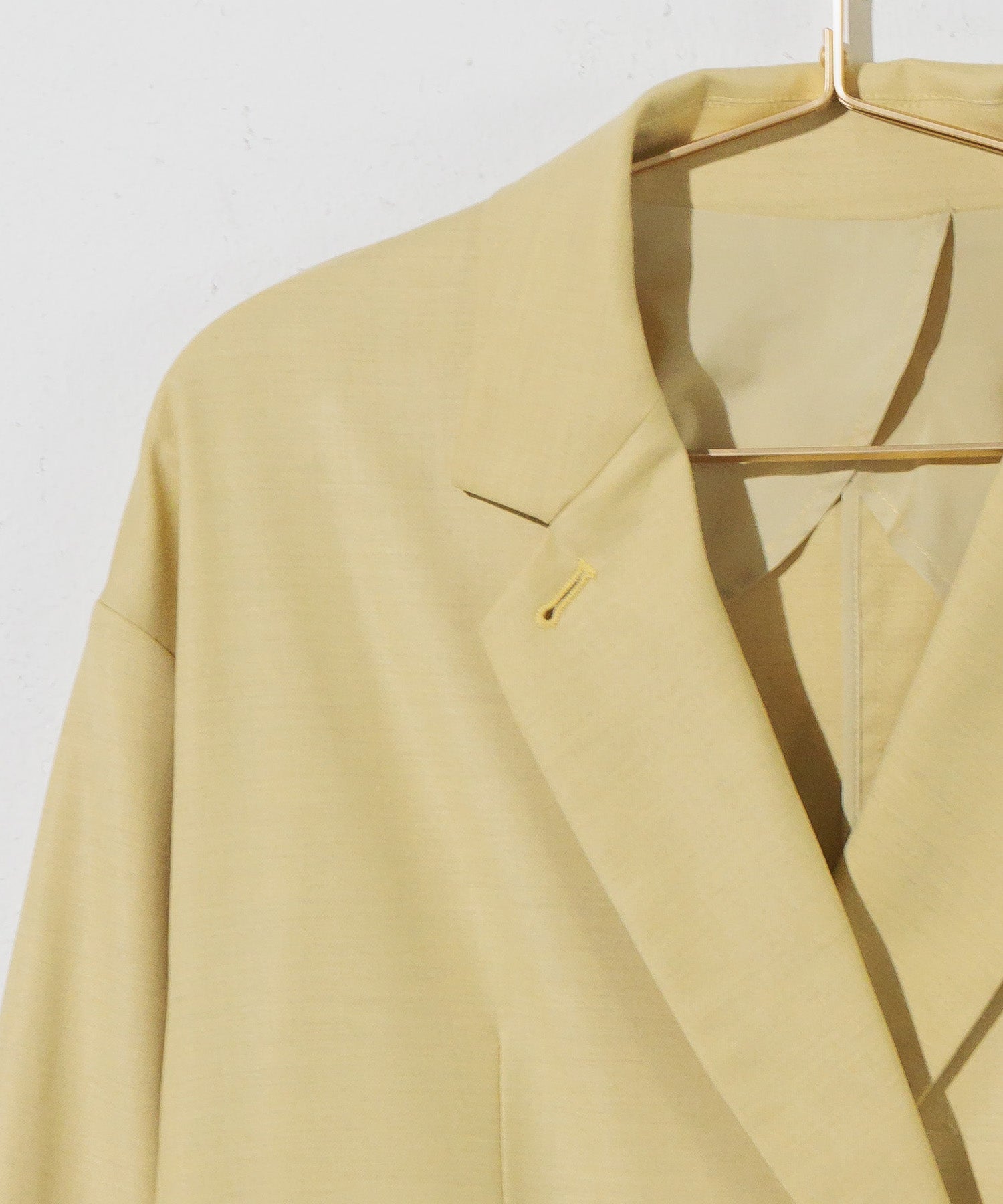 Double-breasted jacket with slit sleeves