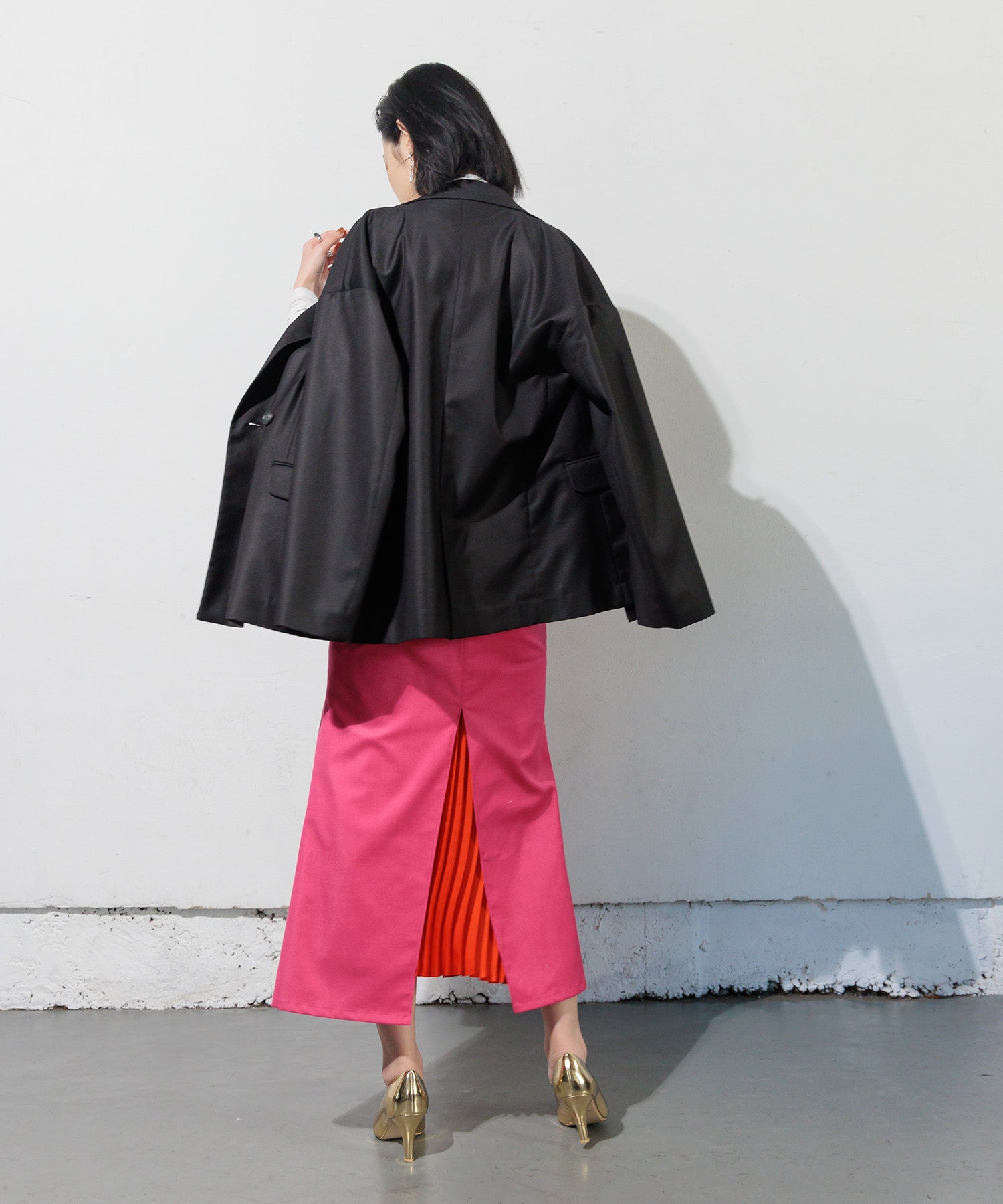 Double-breasted jacket with slit sleeves
