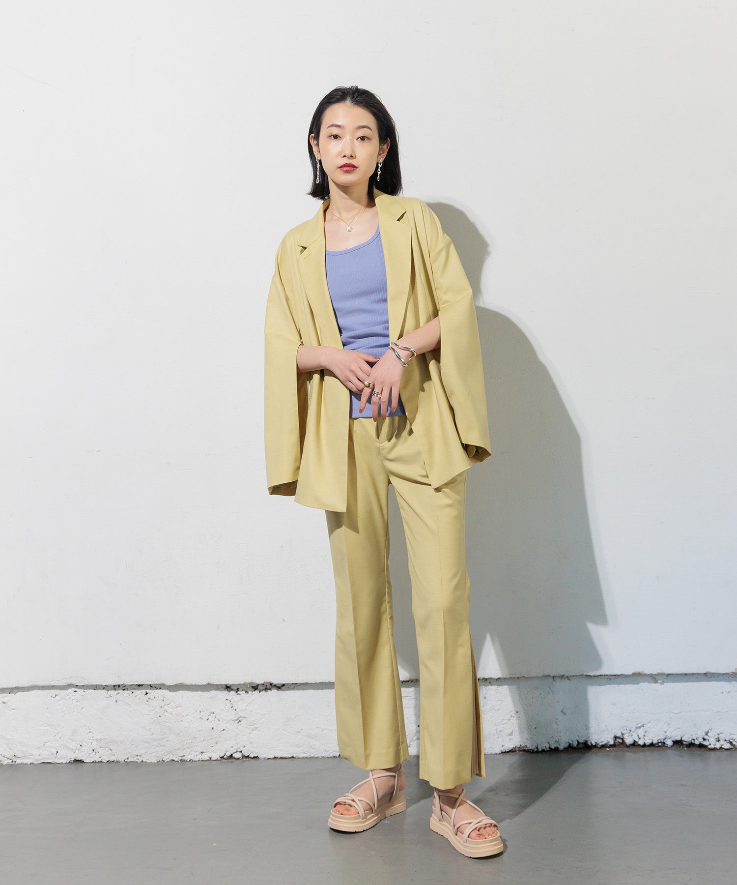 Double-breasted jacket with slit sleeves