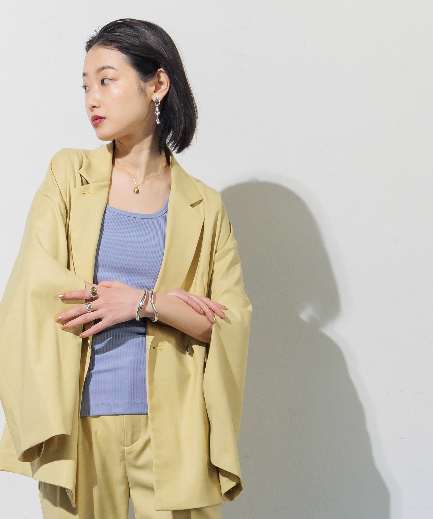 Double-breasted jacket with slit sleeves