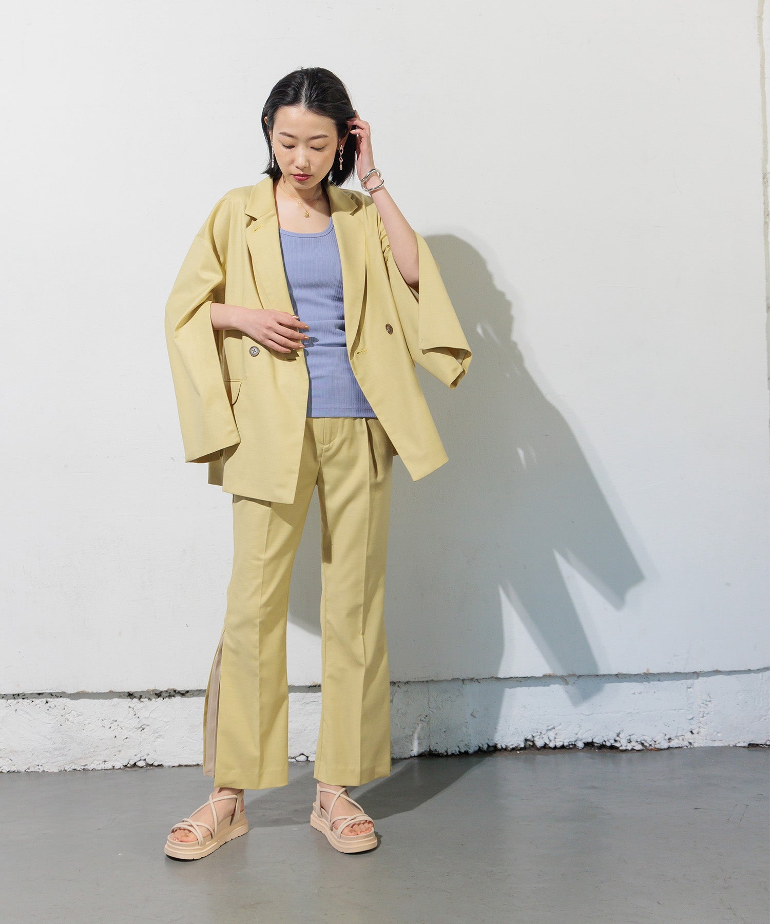 Double-breasted jacket with slit sleeves