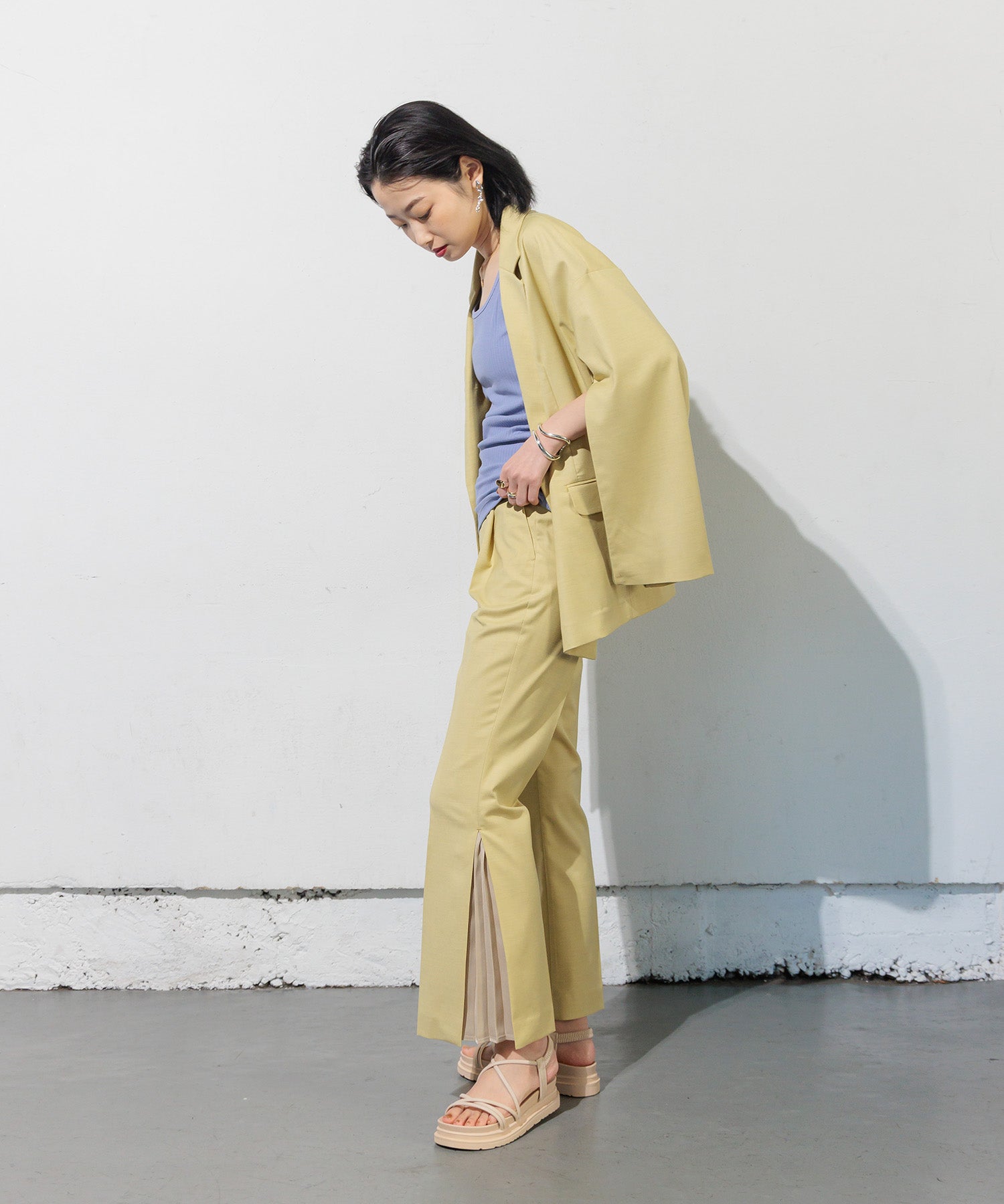Double-breasted jacket with slit sleeves