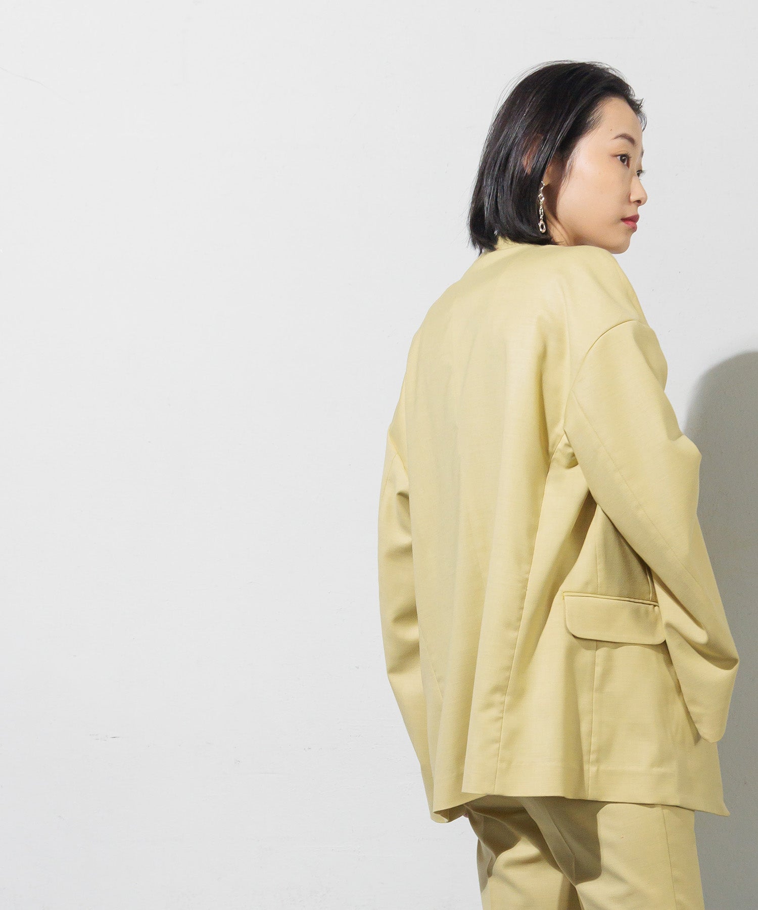 Double-breasted jacket with slit sleeves